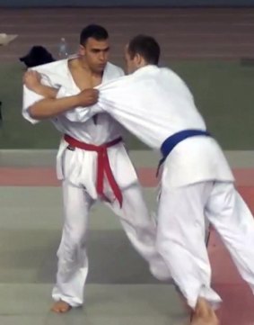 Attacker Mohamed Lahouaiej Bouhlel, left, after seeming to injure his opponent while competing in a martial arts competition in 2010. 