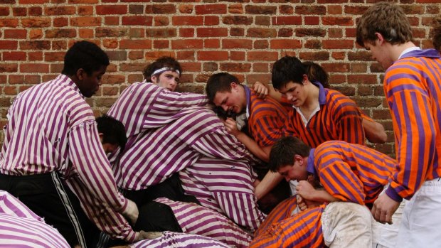 The Collegers and the Oppidians of Eton College take part in the Wall Game, one of the school's oldest traditions, in 2007.