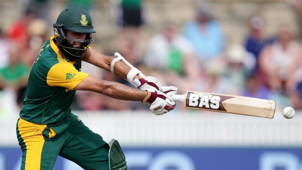 South Africa's Hashim Amla belts a ball during his knock.