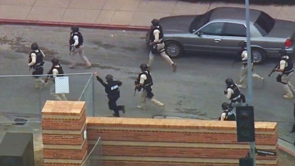 Police respond to the fatal shooting at UCLA. 