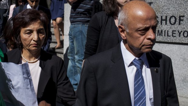 FAMILY SUPPORT: Shrien Dewani's parents, Snila Dewani, left, and Prakash Dewani, leave the High Court after the first day of their son's trial. 