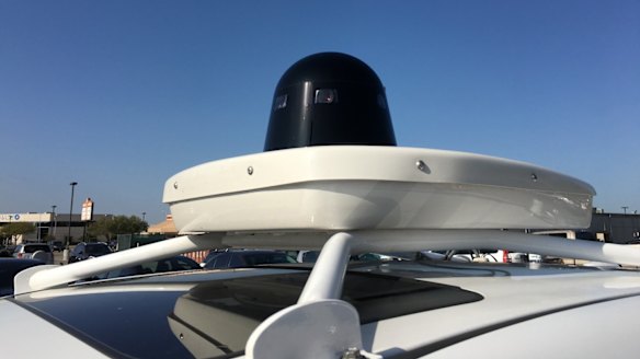 A suite of cameras sits in the black dome, while a fan to keep everything cool is stored in the white box underneath.
