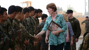 Gold Coast man Reece Harding's mother, Michelle, meets with Kurdish soldiers.
