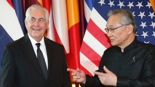 US Secretary of State Rex Tillerson, left, talks with Thai Foreign Minister Don Pramudwinai at the Foreign Ministry in Bangkok.