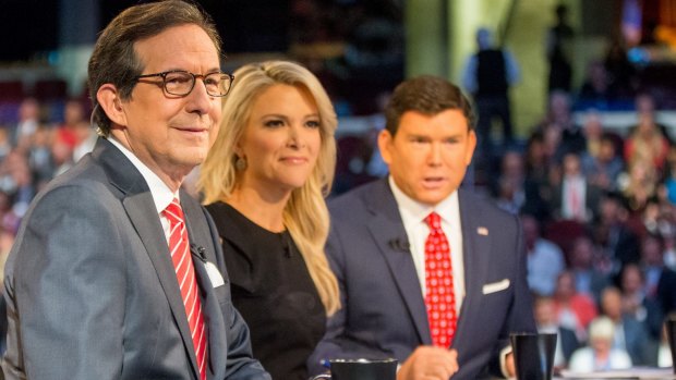 Megyn Kelly, with Chris Wallace and Bret Baier, during the infamous Republican primary debate in August last year.