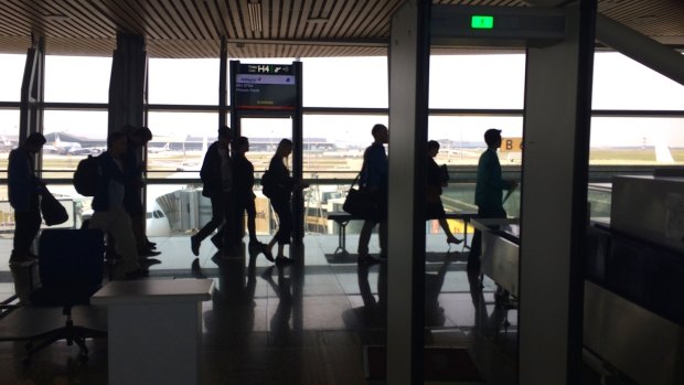 The first four refugees in transit at Kuala Lumpur airport in June 2015.