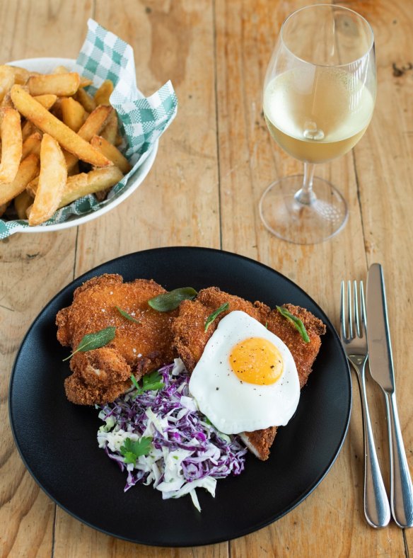 Parmesan-crumbed chicken schnitzel is on the opening menu.