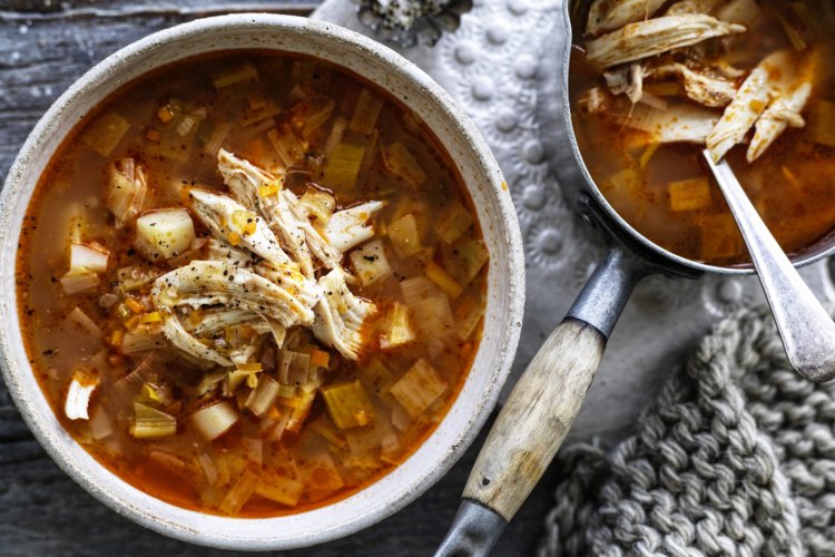 Whole chicken and vegetable soup.