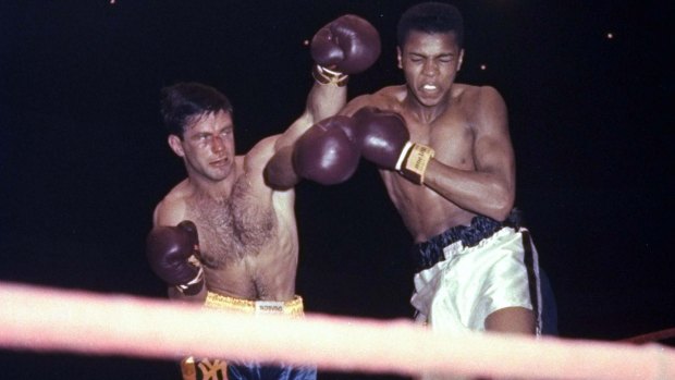 Lasting impression: Tony Madigan fighting Muhammad Ali, then known as Cassius Clay, in 1959.