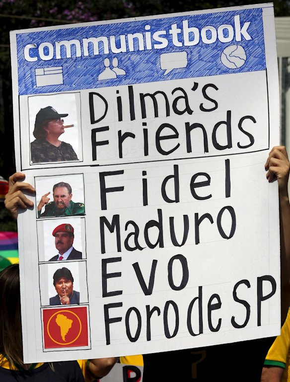 A demonstrator takes issue with Dilma Rousseff's friendly ties with left-wing Latin American governments.   