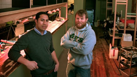 Manu Potoi and Casey Wall at Rockwell & Sons shortly before it opened in 2012.