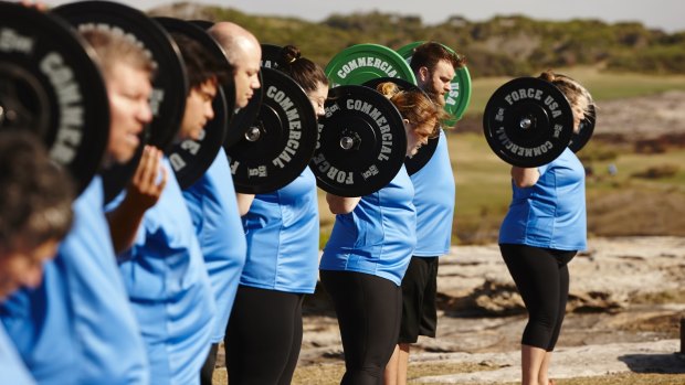 The blue team sweats it out on camera.