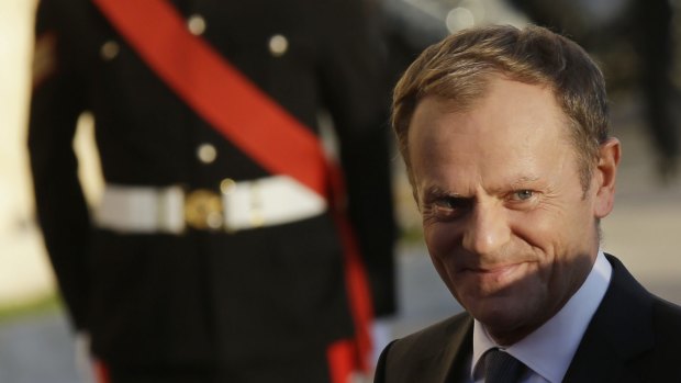 European Council president Donald Tusk arrives at the Auberge de Castille palace.