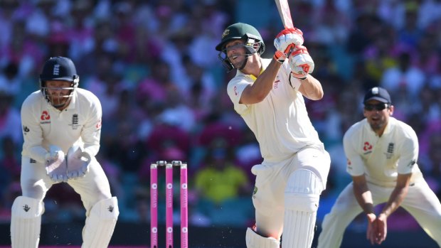 Opening the blade: Mitchell Marsh takes on the England bowlers in a burst of aggression after showing initial caution early in his innings.