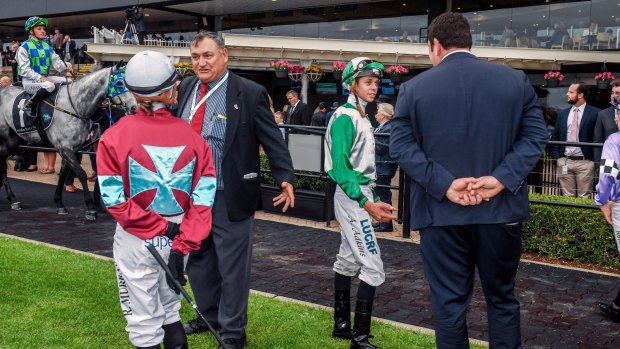 Lucky escape: Jockeys in the mounting yard at Rosehill, where Racing NSW cadet steward Matt Purse was hit in the shoulder.