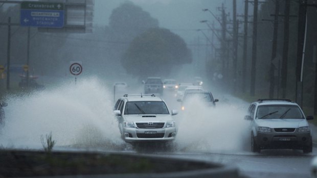 Heavy rain caused flooding across Castlereagh Road in Cranebrook on Tuesday.
