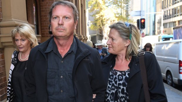 The family of Christine Crickitt leave the Supreme Court in Sydney on Friday, after hearing Sydney GP Brian Crickitt be sentenced to 27 years' prison.