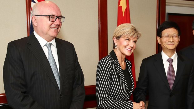 Attorney-General George Brandis, Foreign Minister Julie Bishop and Chinese Central Commission on Political and Legal Affairs, Secretary Meng Jianzhu.