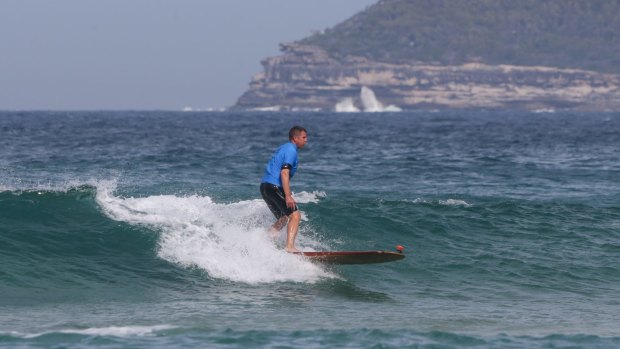 Premier Mike Baird began surfing more than 30 years ago.

