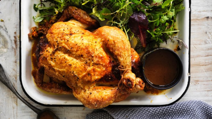 Roast chicken stuffed with spring vegies