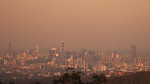 The smoke from the Sunshine Coast bushfire hung over Brisbane on Friday evening.