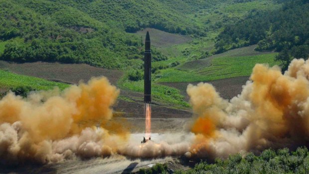 North Korea's first launch of a Hwasong-14 intercontinental ballistic missile, which took place in early July.