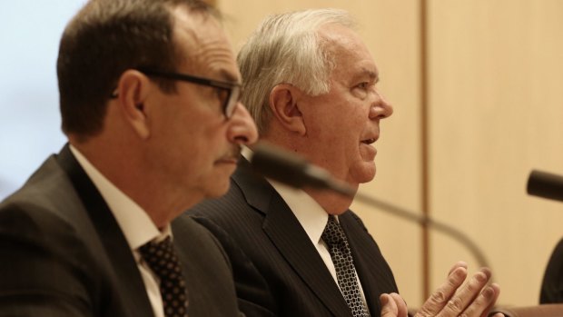 7-Eleven chairman Michael Smith and owner Russell Withers appeared before a Senate inquiry.