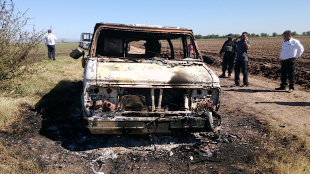 The burnt-out van registered to missing Australian surfer Adam Coleman.