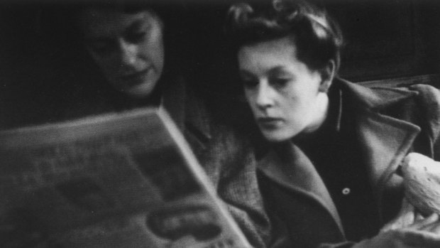 Sunday Reed with artist Joy Hester holding son, Sweeney. On the train travelling to Point Lonsdale, Bellarine Peninsula, June, 1945