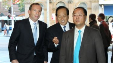Huang Xiangmo with former prime minister Tony Abbott.