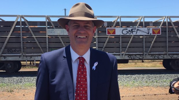 Transport Minister Stirling Hinchliffe was all smiles as the cattle train arrived at Oakey Abattoir.