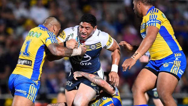 On the charge: Jason Taumalolo charges into the Parramatta defence.
