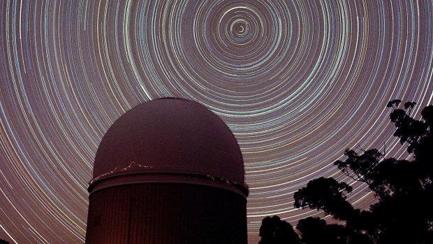 Star trails around the south celestial pole above the Australian Astronomical Observatory in the Warrumbungle National Park, which was used to help find the Vela supercluster.