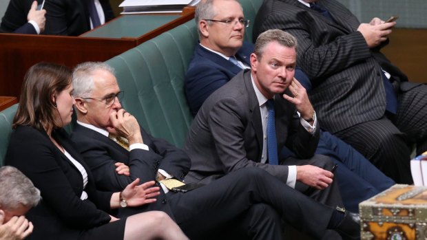 The glum Liberal faces sums up the government's mood after the chaotic vote.
