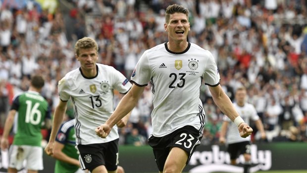 Mario Gomez celebrates scoring Germany's goal.