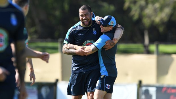Happy Blues: Andrew Fifita hugs Mark Donaldson VC at NSW training.