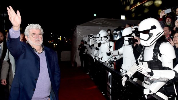 George Lucas, guarded by Stormtroopers, at the world premiere of <i>Star Wars: The Force Awakens</i> in Hollywood. The film is tipped to be huge at the Australian box office. 