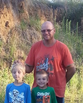 Steven Van Lonkhuyzen and his sons after being found.