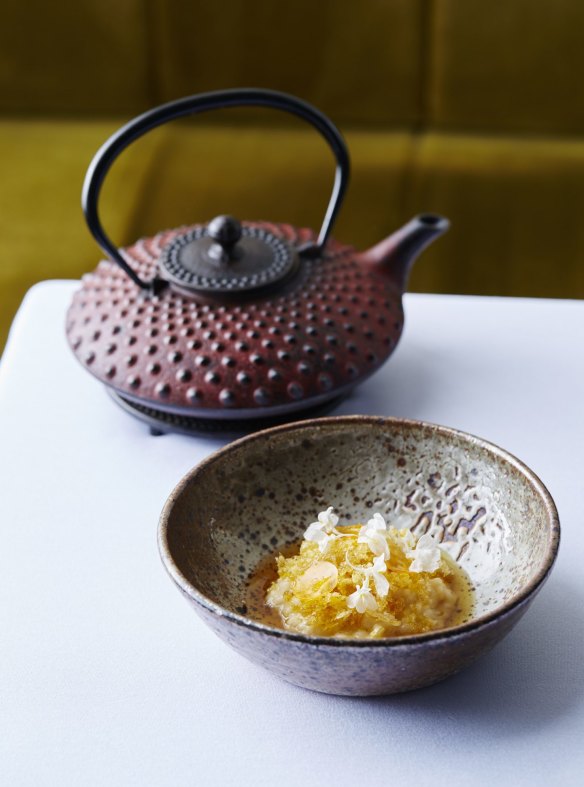 Uni, koshihikari rice, salted yolk, fish maw, sweet prawns, umami broth from Quay, Sydney.