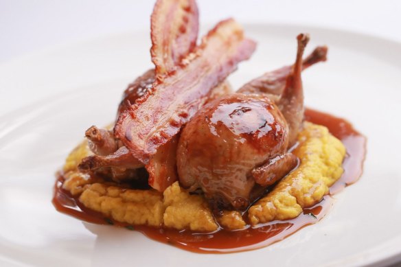 Sage-stuffed quail with bacon and jus.