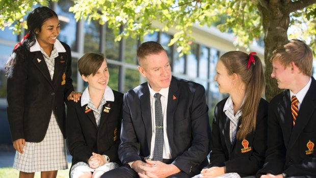 Principal Dr Mark Merry catches up with some of his students at Yarra Valley Grammar School.