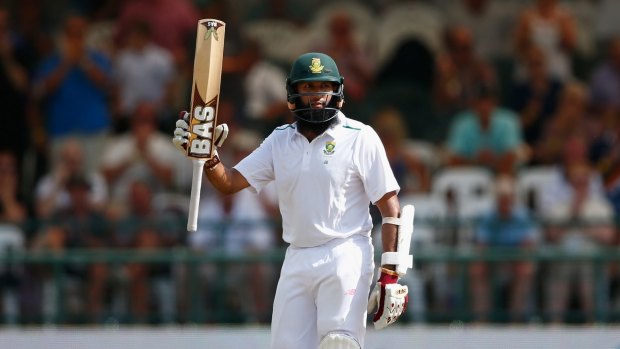 Hashim Amla celebrates his 150 on day three of the 2nd Test against England at Newlands.