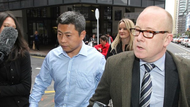 Leo Gao leaves Auckland District Court with his lawyer Ron Mansfield in 2012 after pleading  guilty.