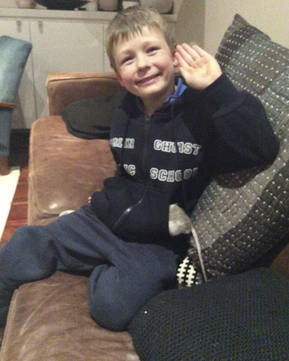 Tanya Plibersek's son Louis with the rat he and his siblings named Harry. 