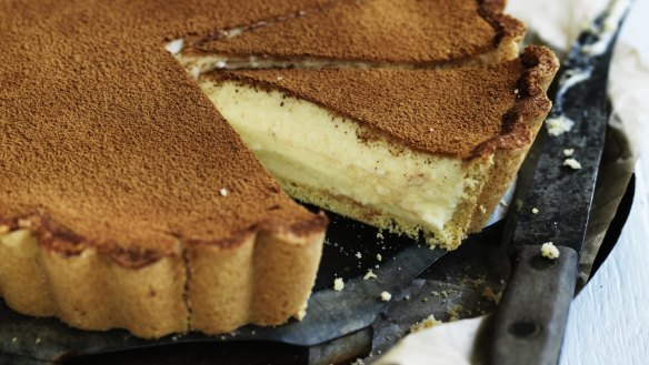 This milky custard tart is dusted with cinnamon.