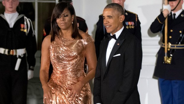 Michelle Obama in a gown designed by Atelier Versace for the Italy state dinner in October.