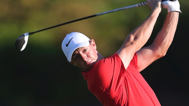 Tiger's legacy: Rory McIlroy looks to emulate his hero, Tiger Woods, at Augusta National.
