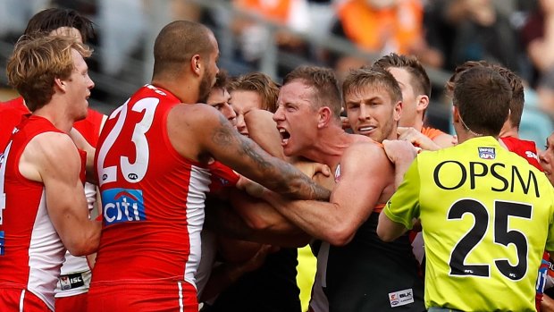 Flashpoint: Steve Johnson gets into a fight with Lance Franklin during last year's qualifying final.