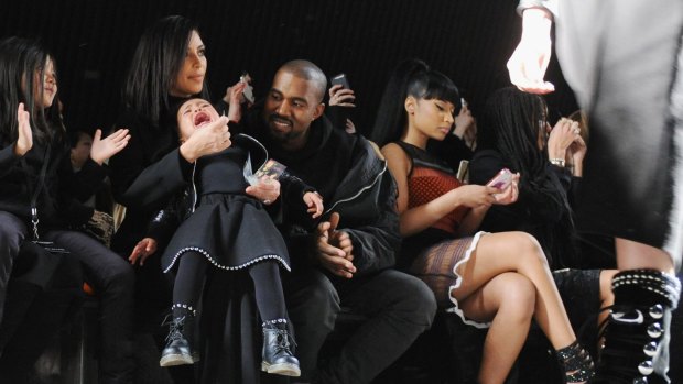 Kim Kardashian, North West, Kanye West and Nicki Minaj attend the Alexander Wang Fashion Show during New York Fashion Week.