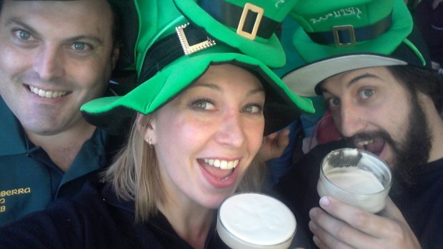 St Patrick's Day celebrants enjoy the regulation pint of Guinness.